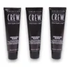 Trei tuburi negre identice de vopsea American Crew Precision Blend, așezate alături