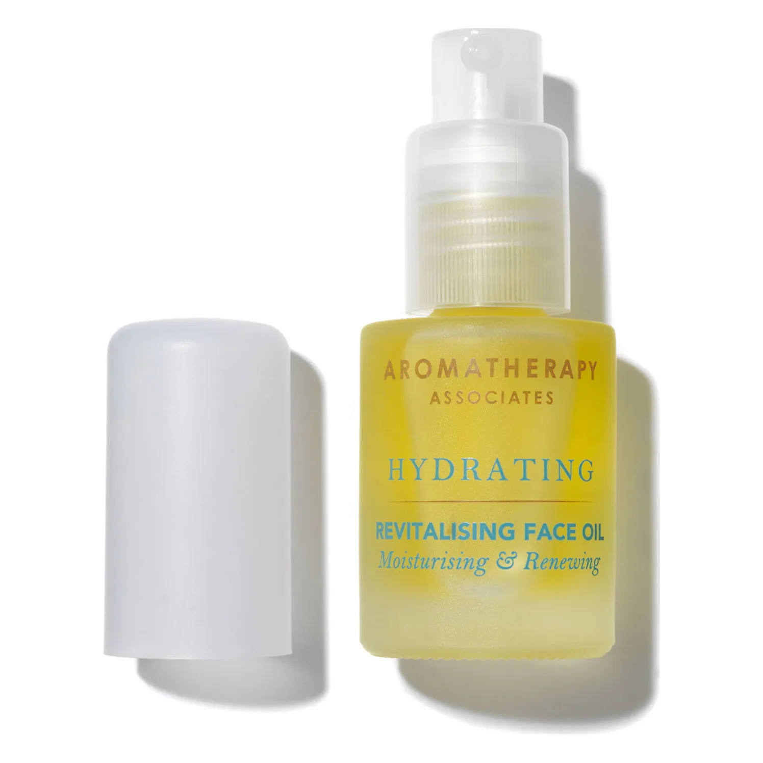 Ulei de față Aromatherapy Associates Hydrating Revitalising Face Oil 15 ml Flacon de sticlă mată cu ulei galben de față Aromatherapy Associates Hydrating Revitalising, 15 ml, cu pompiță și capac alb