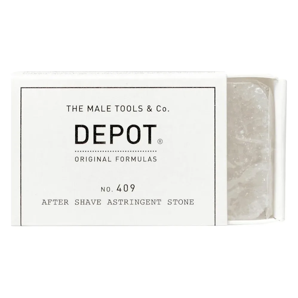 Piatră de alaun Depot No. 409, 90 g Cutie albă Depot No. 409 cu piatra de alaun translucidă scoasă parțial din ambalaj