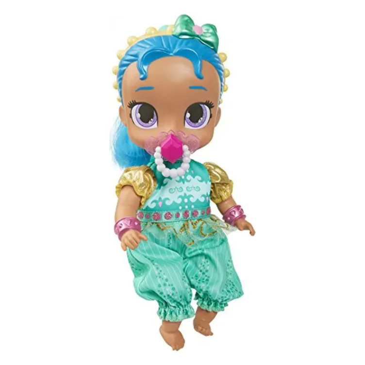 Păpușă Genie Babies Shine 27 cm Păpușă Shine din linia Genie Babies, cu păr albastru, ținută turcoaz și suzetă cu bijuterie