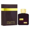 Cutie maro cu bandă aurie lângă flaconul roșu Ramz Lattafa Gold, eau de parfum