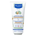 Flacon de șampon nutritiv Mustela cu unt de shea pentru păr creț, 200 ml