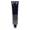 Spatele tubului negru de 60 ml, cu banda roșie Vibrant Reds și textul avertismentelor