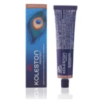 Tub de vopsea Koleston Perfect Pure Naturals lângă cutia albastră cu pană de păun