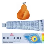 Tub și cutie Koleston Perfect Special Mix lângă mostra de culoare aurie a nuanței 0/33